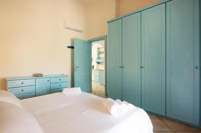 Letto o letti in una camera di Sardegna è - Beach Apartment LE