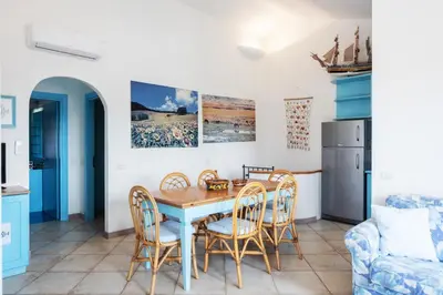 Cucina o angolo cottura di Sardegna è - Beach Apartment LE