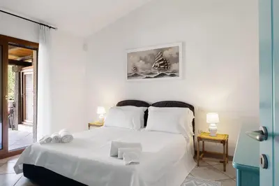 Letto o letti in una camera di Sardegna è - Beach Apartment LE