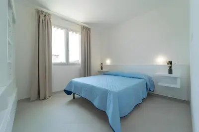 Letto o letti in una camera di Luxi by NG Collection