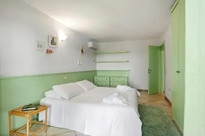 Letto o letti in una camera di Sardegna è - Beach Rooms LE