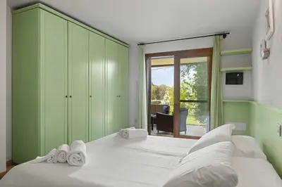 Letto o letti in una camera di Sardegna è - Beach Rooms LE