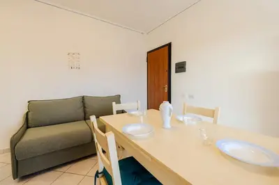 Area soggiorno di Appartamento con 1 camera da letto Baia Turchese