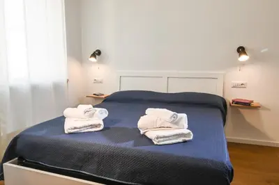Letto o letti in una camera di My Holiday Olbia Rooms&Lounge by Rentbeat