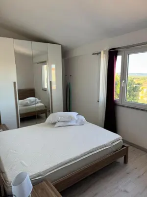 Letto o letti in una camera di Vista Tavolara