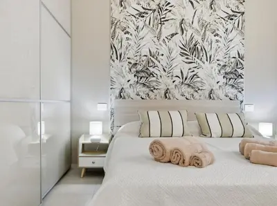 Letto o letti in una camera di Residence Moresca , Appartamento Tavolara con Giardino e Vista Mare a 80 mt dalla Spiaggia