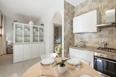 Cucina o angolo cottura di Residence Moresca , Appartamento Tavolara con Giardino e Vista Mare a 80 mt dalla Spiaggia