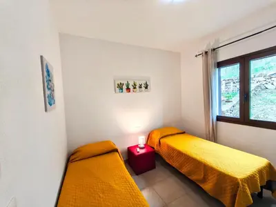 Letto o letti in una camera di Comfortable apartment near Budoni