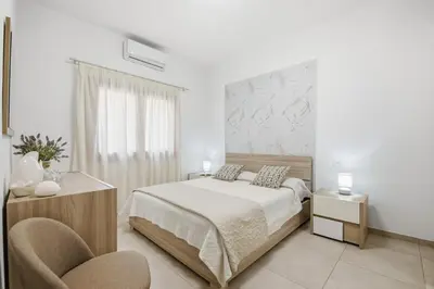 Letto o letti in una camera di Figarolo apartment by Residence Moresca