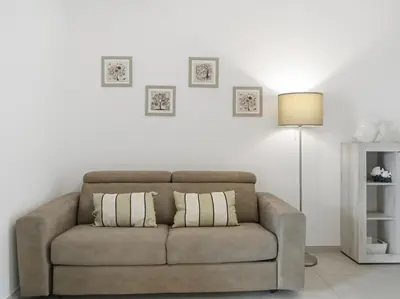 Area soggiorno di Figarolo apartment by Residence Moresca