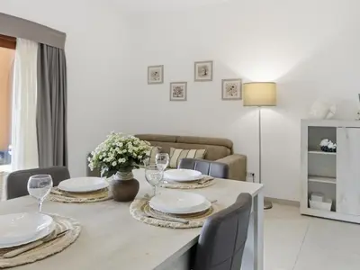 Area soggiorno di Figarolo apartment by Residence Moresca
