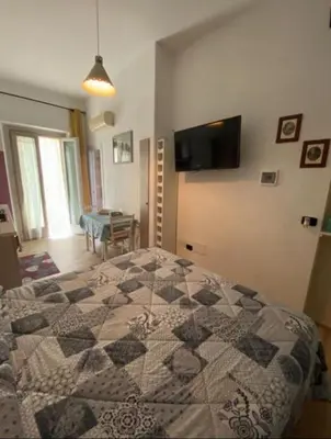 Letto o letti in una camera di B&B La Caldosa