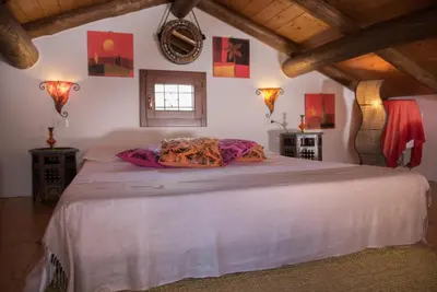 Letto o letti in una camera di La Casa dell'Artista - Villa completamente recintata con giardino privato