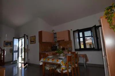 Cucina o angolo cottura di APT 800 METRI Spiaggia Agrustos 2 PAX