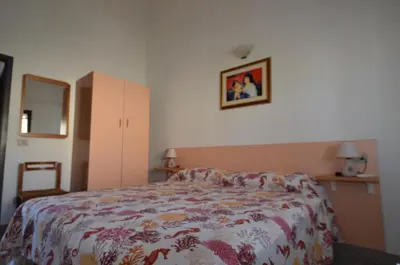 Letto o letti in una camera di FAGR-GAI014P Apt 800 mt spiaggia