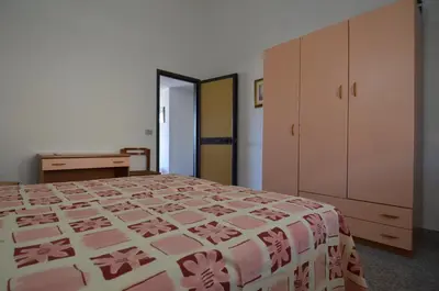 Letto o letti in una camera di FAGR-GAI014P Apt 800 mt spiaggia