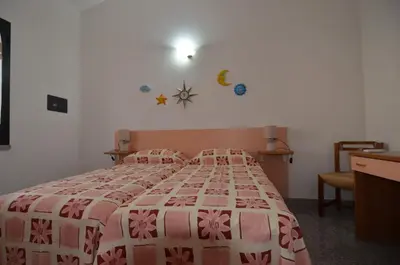 Letto o letti in una camera di FAGR-GAI014P Apt 800 mt spiaggia