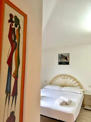 Letto o letti in una camera di Casa Arturo