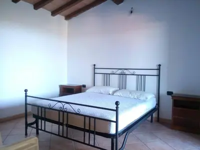 Letto o letti in una camera di Viva Houses San Teodoro