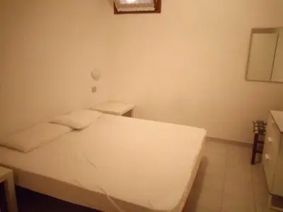 Letto o letti in una camera di Appartamento Residence Giulia