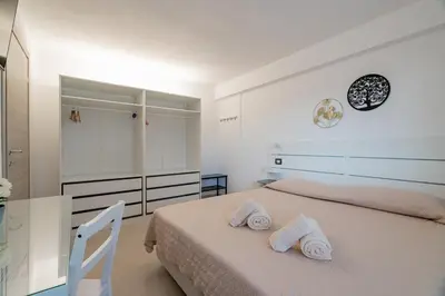 Letto o letti in una camera di Domo Archea, al centro di Olbia
