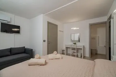Letto o letti in una camera di Domo Archea, al centro di Olbia