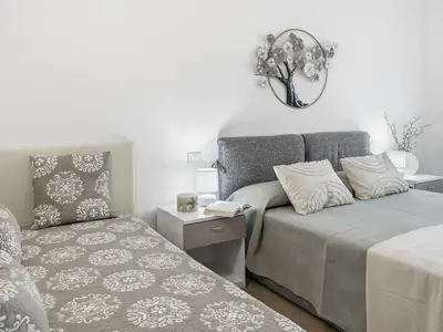 Letto o letti in una camera di Monte Ruju Apartment by Residence Moresca