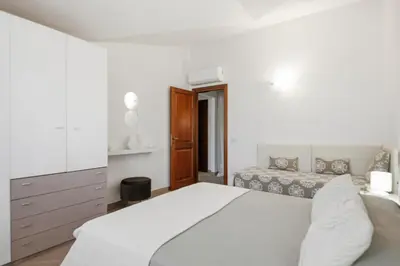 Letto o letti in una camera di Monte Ruju Apartment by Residence Moresca