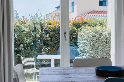 Area soggiorno di Residence with panoramic swimming pool in Porto San Paolo just 850 mt from the sea