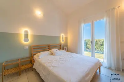 Letto o letti in una camera di Villa Harmony by Searly