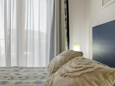 Letto o letti in una camera di Molarotto , Sea View by Residence Moresca