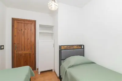 Letto o letti in una camera di Villa La Dolce Teodoro - Spacious Family Villa Near Beaches & Center