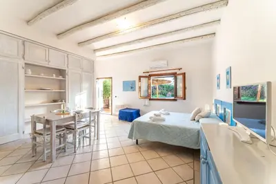 Letto o letti in una camera di Villa Antonina