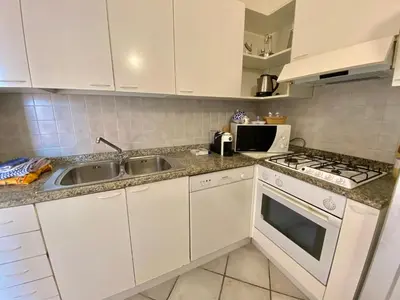 Cucina o angolo cottura di ISA - Luxury apartment Elicriso sea view with common swimming pool just 100 mt from the beach