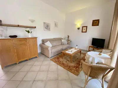 Area soggiorno di ISA - Luxury apartment Elicriso sea view with common swimming pool just 100 mt from the beach