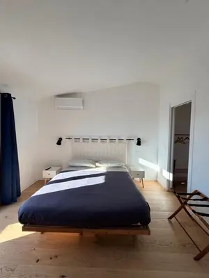 Letto o letti in una camera di B&bo Nuoro centro