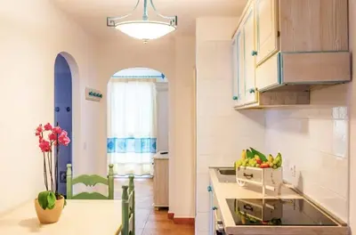 Cucina o angolo cottura di Charming Baia Marina with Stunning Views 1BR