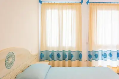 Letto o letti in una camera di Charming Baia Marina 1 BR premier Apt Terrace