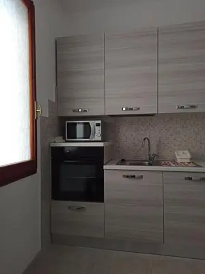 Cucina o angolo cottura di Casa Vacanze AnnaLù IUN R5074