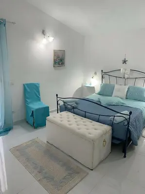 Letto o letti in una camera di Il Giardino delle Fate