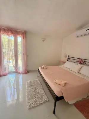 Letto o letti in una camera di Il Giardino delle Fate