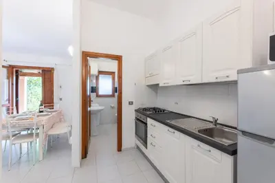 Cucina o angolo cottura di Residenze Gallura 6 people Apartment