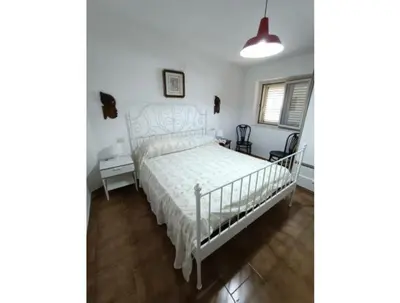 Letto o letti in una camera di San Teodoro Living House