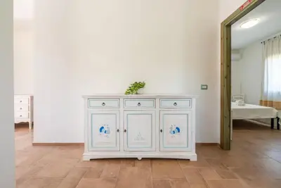 Letto o letti in una camera di Sardinian flat close to stunning beaches