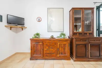 TV o dispositivi per l'intrattenimento presso Relaxing apartment close to Santa Lucia beach