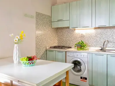 Cucina o angolo cottura di Apartment 6 beds in Residence in Golfo Aranci just 150 mt from the sea