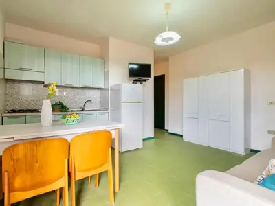 Cucina o angolo cottura di Apartment 6 beds in Residence in Golfo Aranci just 150 mt from the sea
