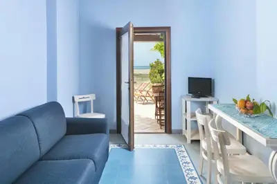 TV o dispositivi per l'intrattenimento presso Appartamenti Baia Smeralda