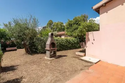 Giardino di San Teodoro flat steps from the beach