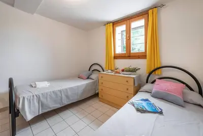 Letto o letti in una camera di Beachside apartment for a relaxing holiday